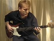 Playing a C on the A string at the 3rd Fret.