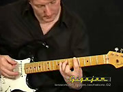 Playing the chord of A5.