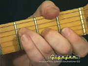 Playing the chord of F.