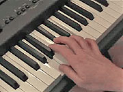 Playing the chord of A.