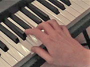Playing the Chord of G.